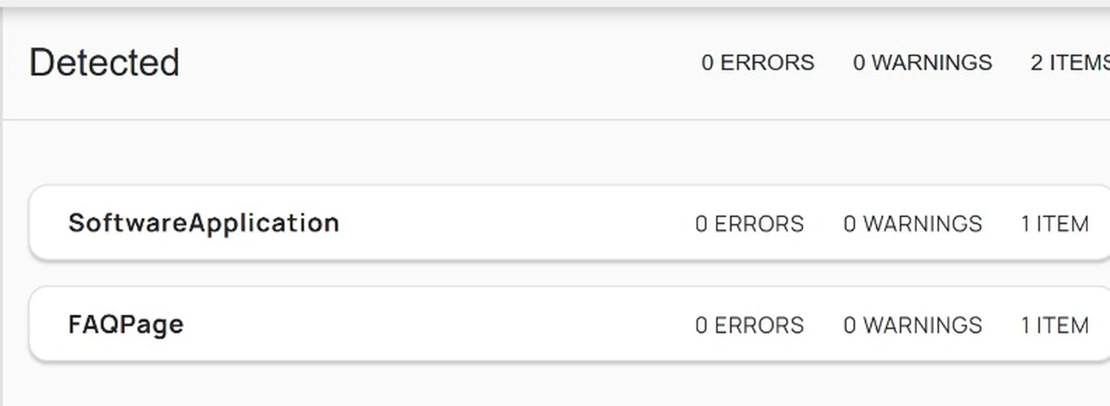 Schema.org validator showing two detected types, SoftwareApplication and FAQPage, both with zero errors and zero warnings.
